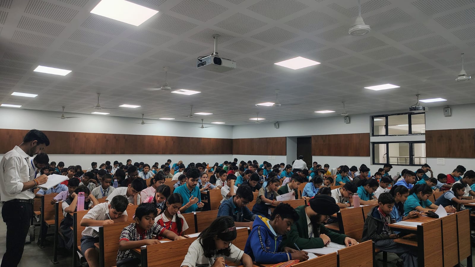 Participants in a quiz hall