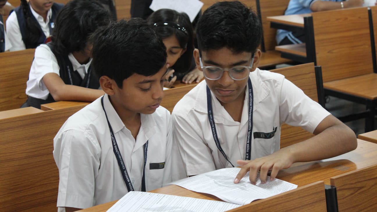 Students discussing questions