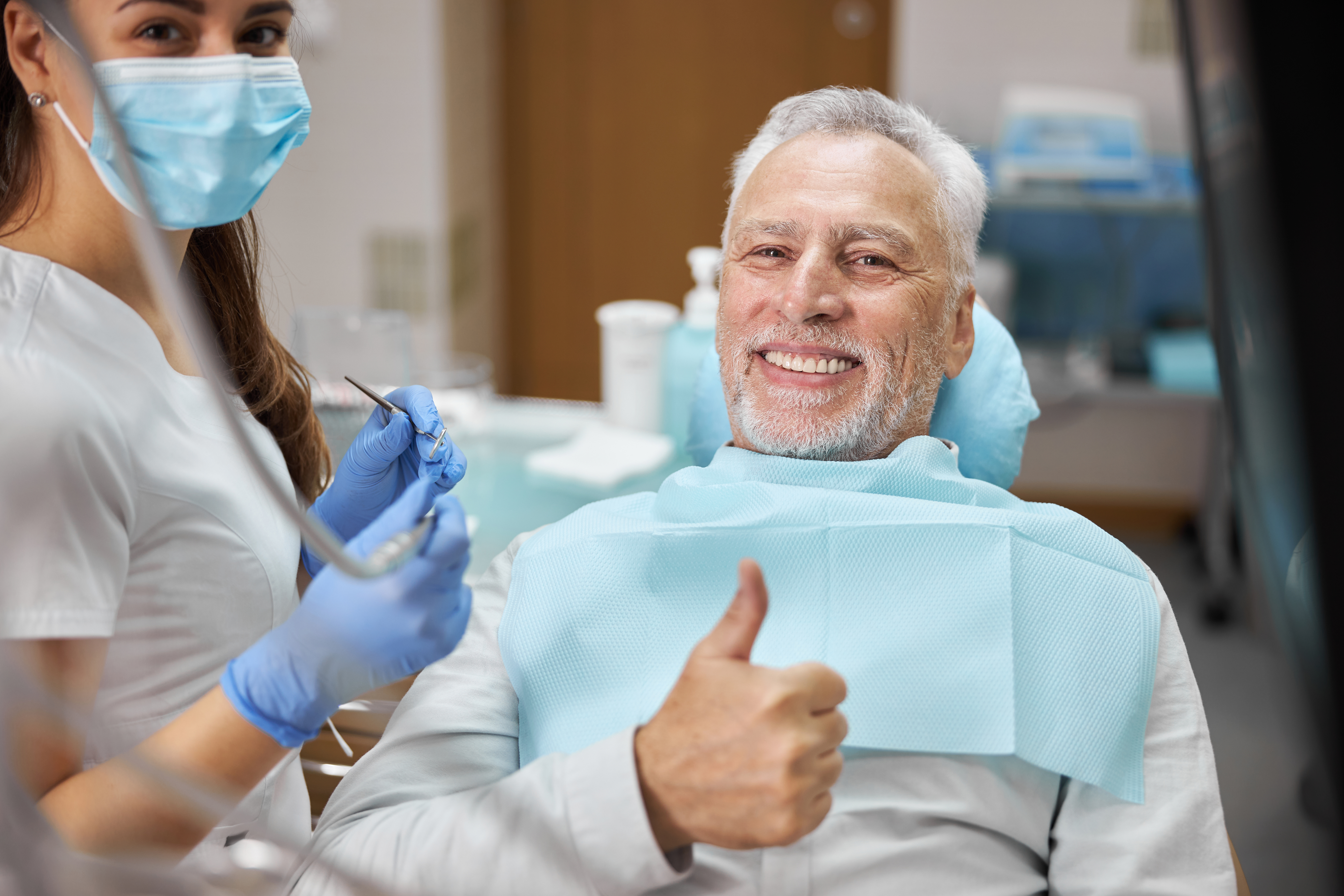 Senior Patient Smiling Thumbs Up